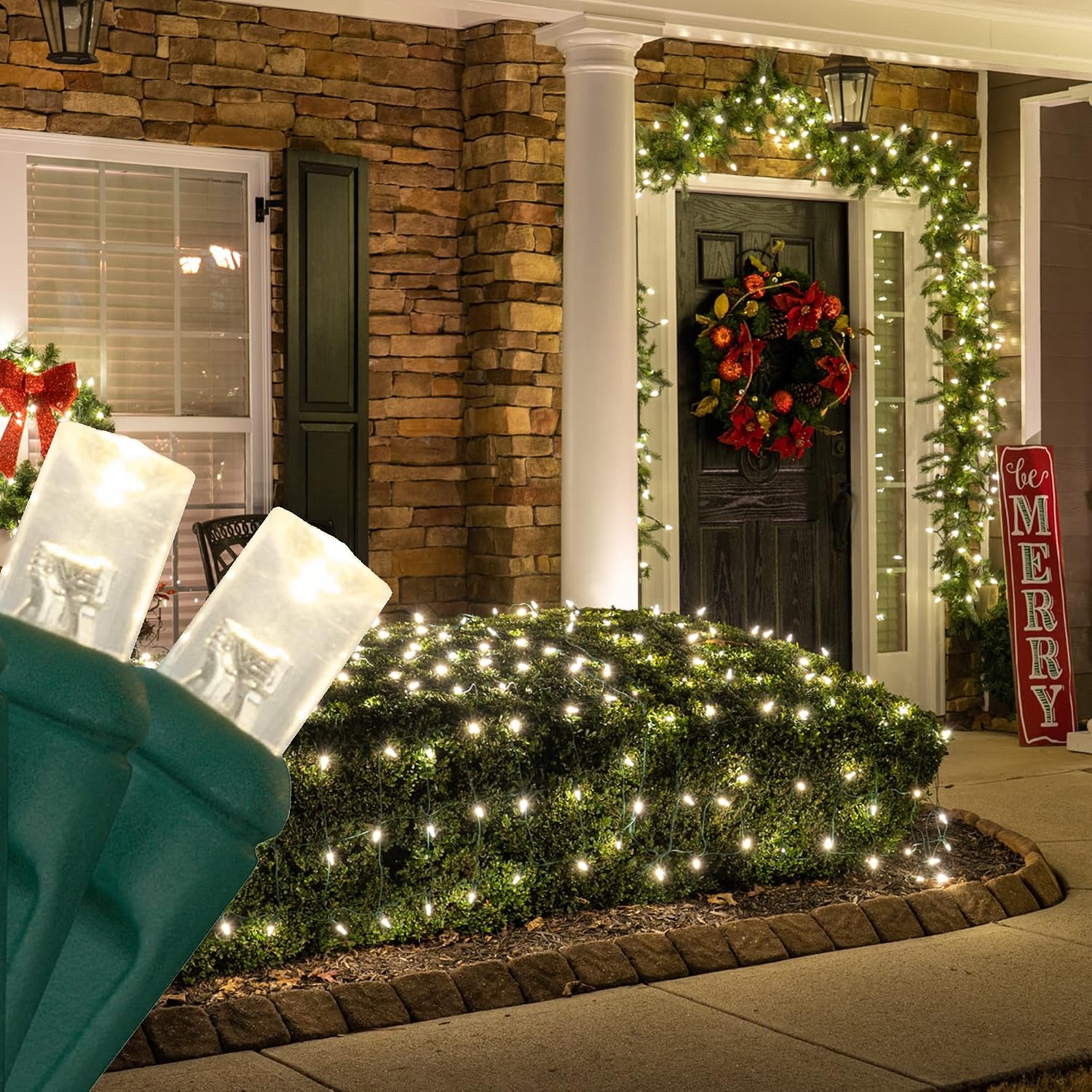 Warm-white LED net lights covering shrubs outside a decorated home